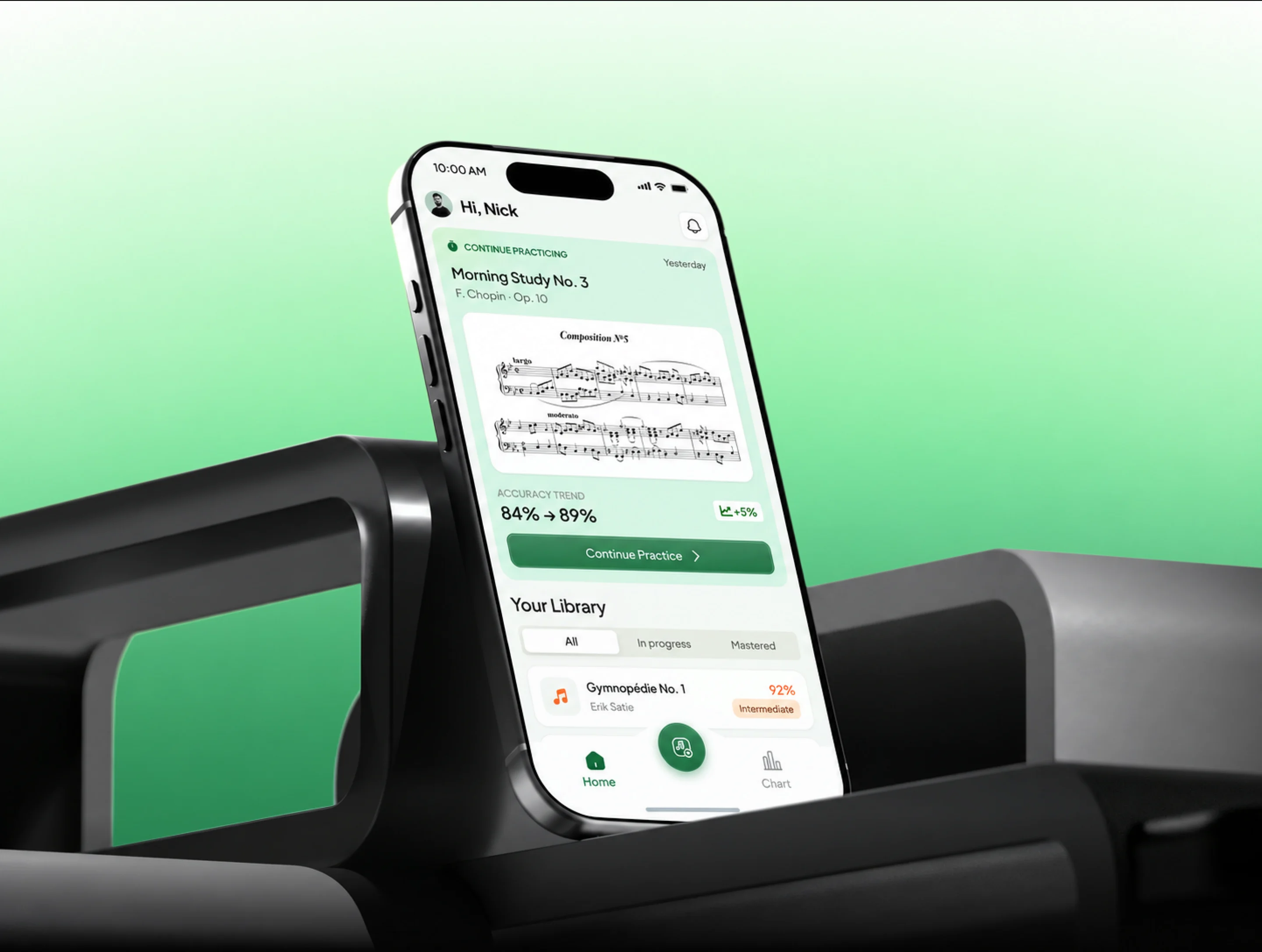 The Nota app on a phone standing against dark curved forms on a green ground: Morning Study No. 3 by Chopin with its score, an accuracy trend climbing from 84 to 89 percent, and a library holding Gymnopedie No. 1.