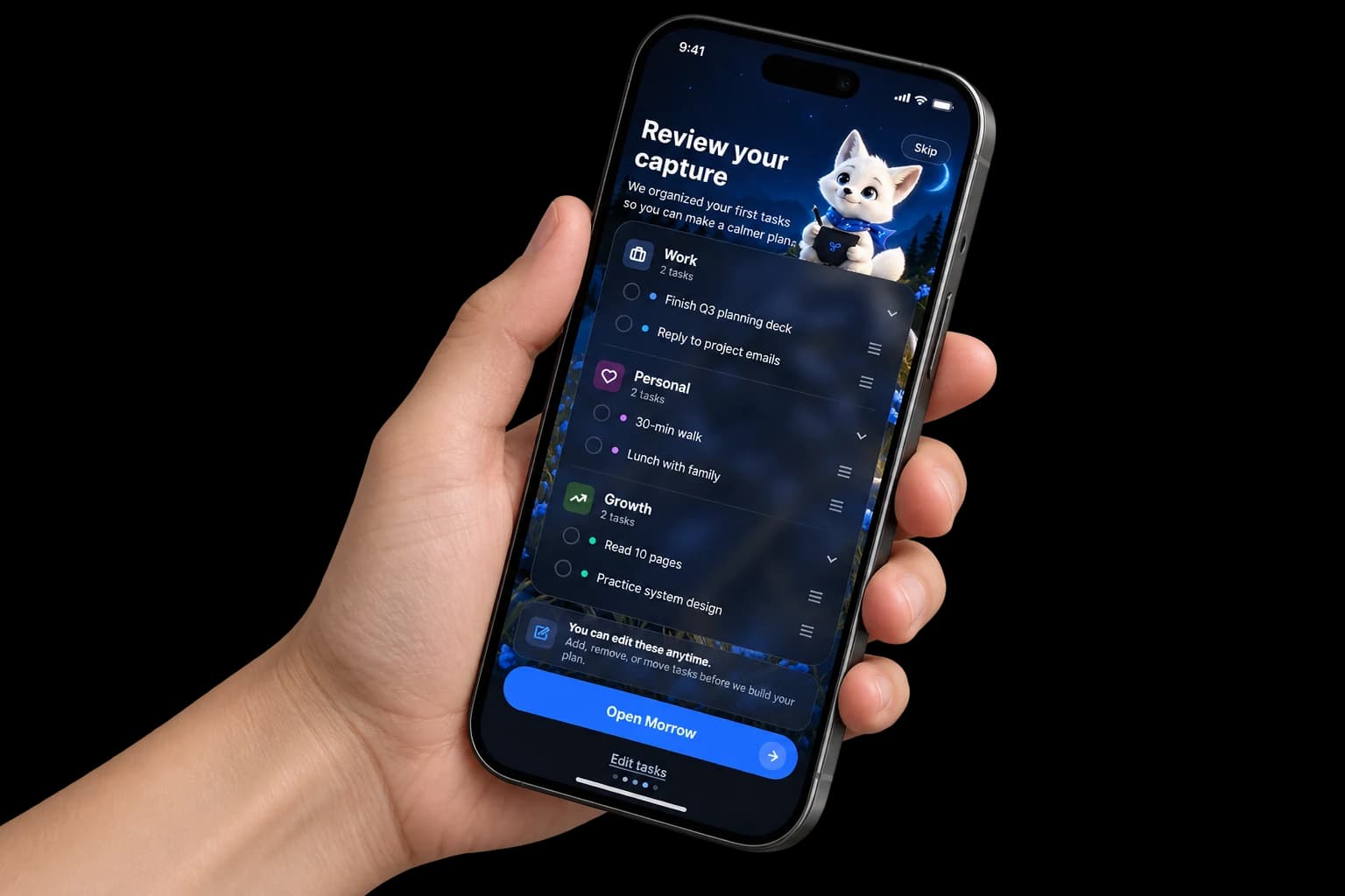 A hand holding a phone that shows Review your capture: the first tasks grouped as Work, Personal and Growth, with a white fox mascot and a button that opens the app.